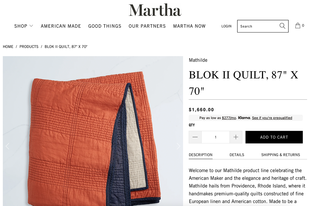 A screenshot of an orange and blue quilt on the Martha.com website