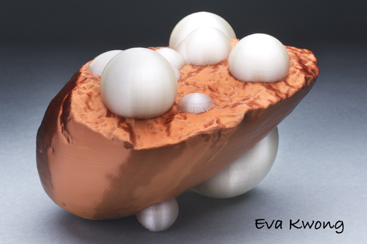 A bronze sculpture studded with white spherical protrusions