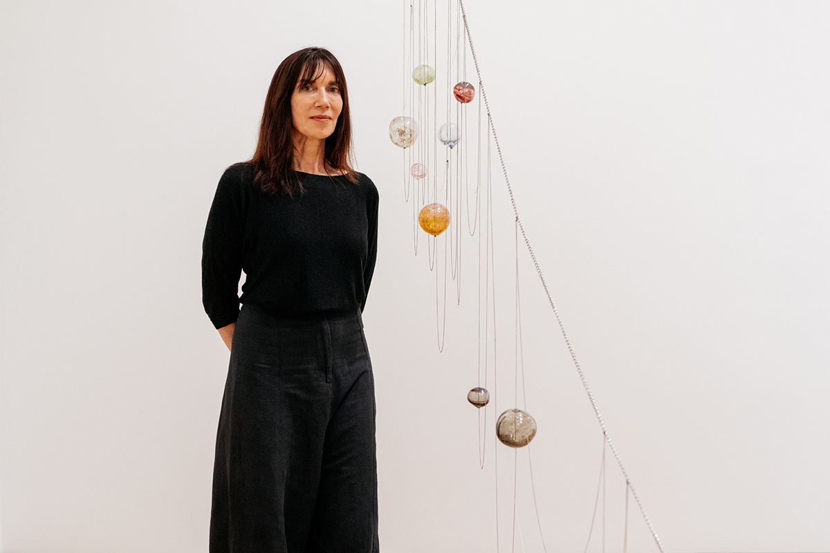 Artist Jillian Conrad with her installation in What drawing can be: four responses. Photo by Lauren Marek.