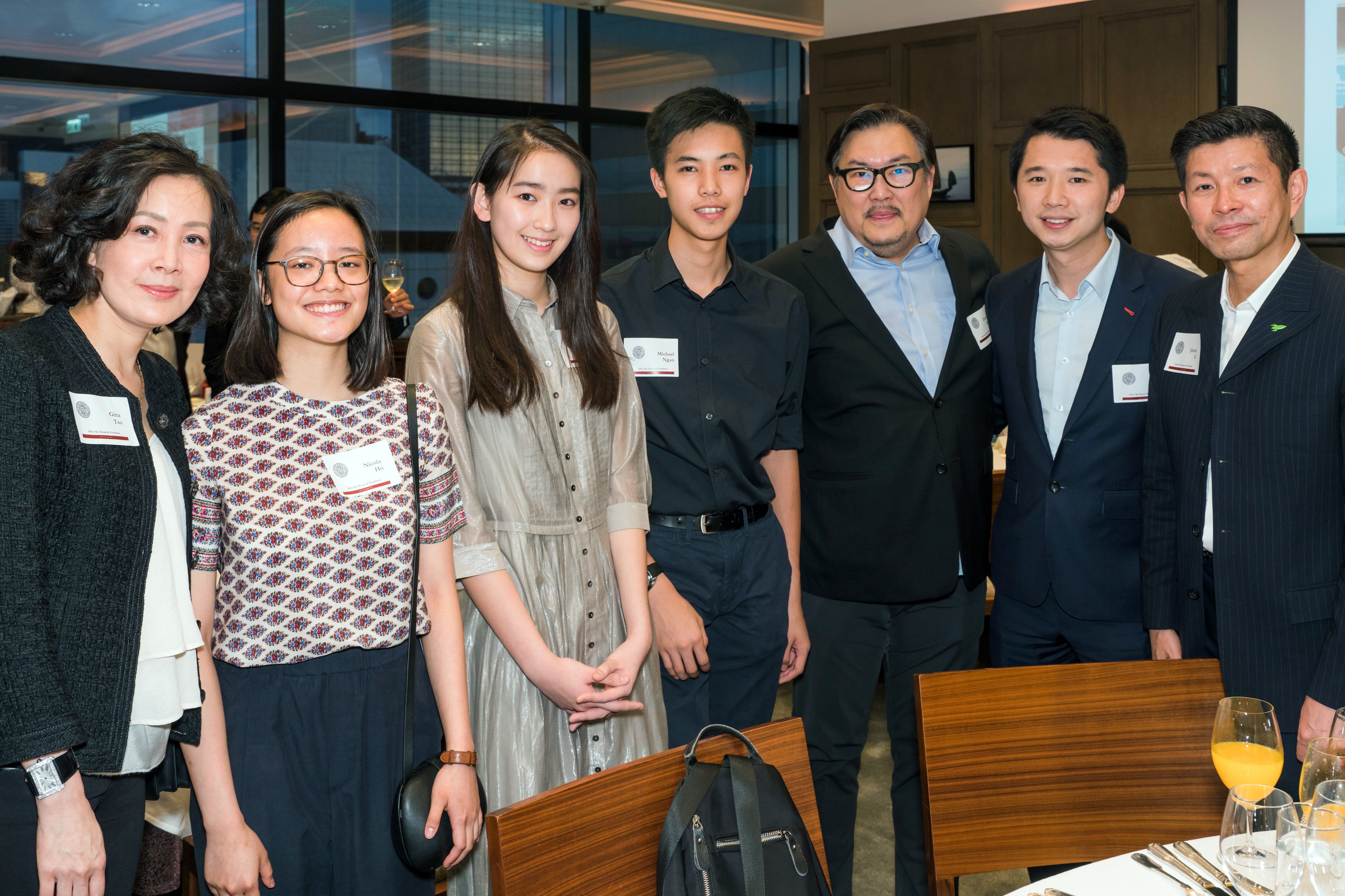 Photo of RISD alumni and students posing for a photo.