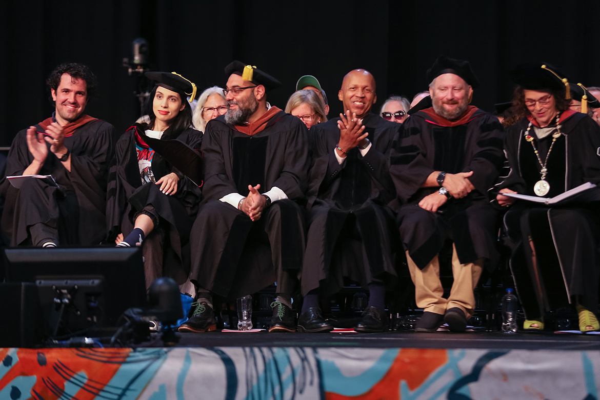 Photo of professors and honorees during commencement.