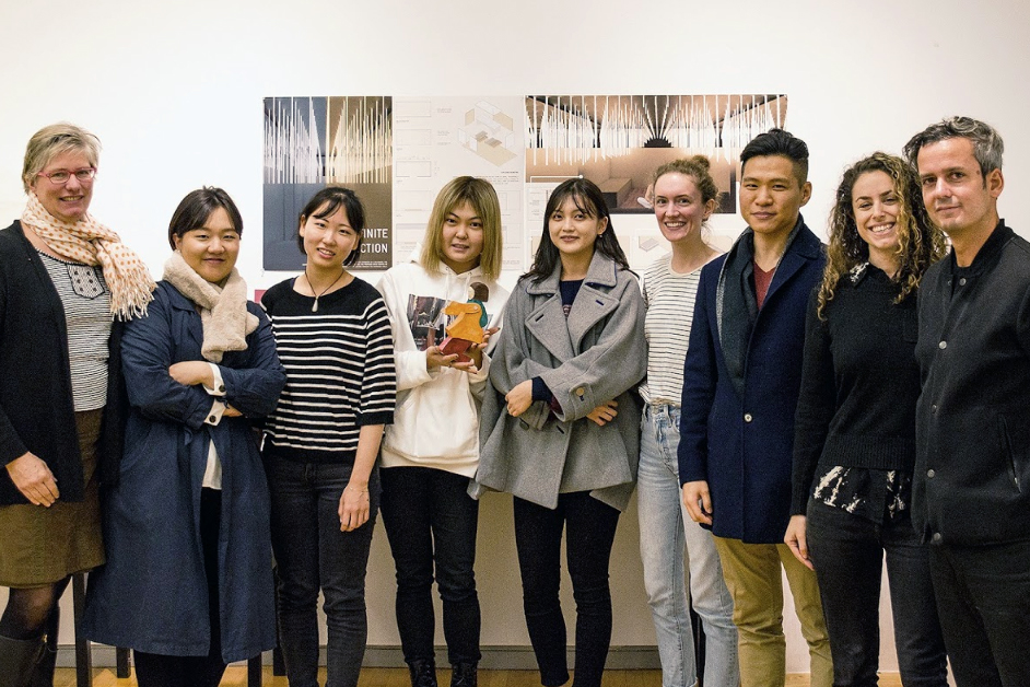 Photo of the winning team who designed their proposed space using mirrors and ropes of light.