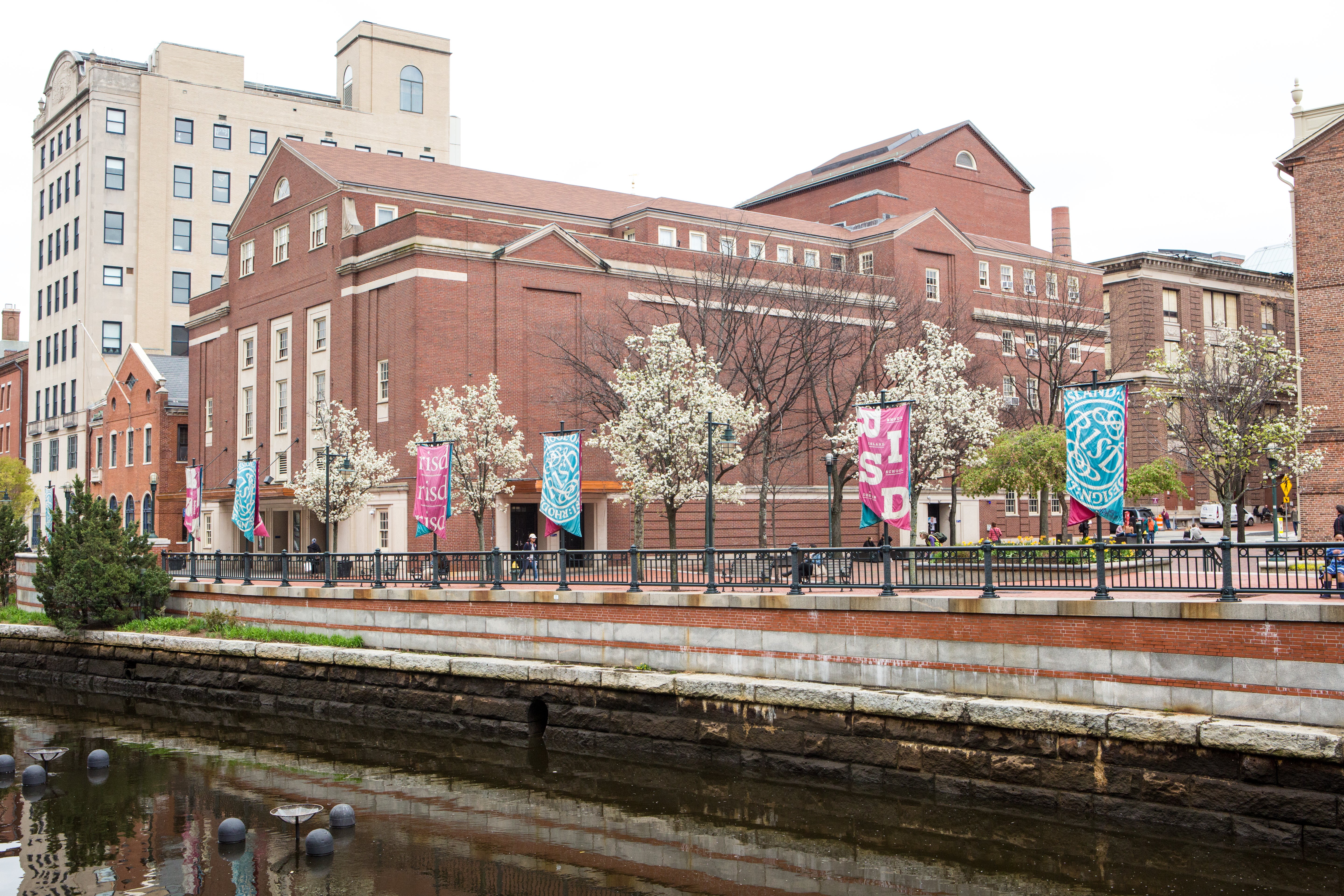 Photo of RISD flags along the River Walk