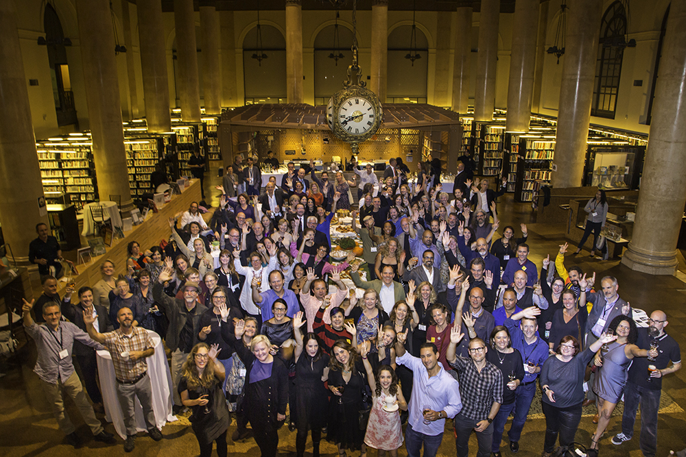 Photo of alumni at a class dinner in the Fleet Library at RISD