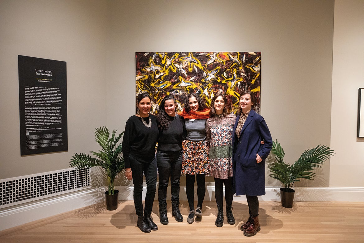 Five artists posing at a Third Thursday event in the RISD Musuem’s newly renovated Metcalf Galleries.