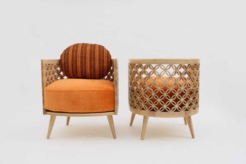 Arabesque Chair in hand-perforated solid French oak.