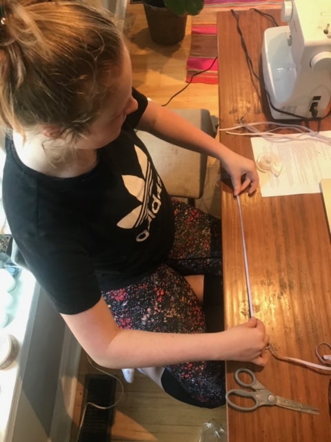 Making respirator cuffs.