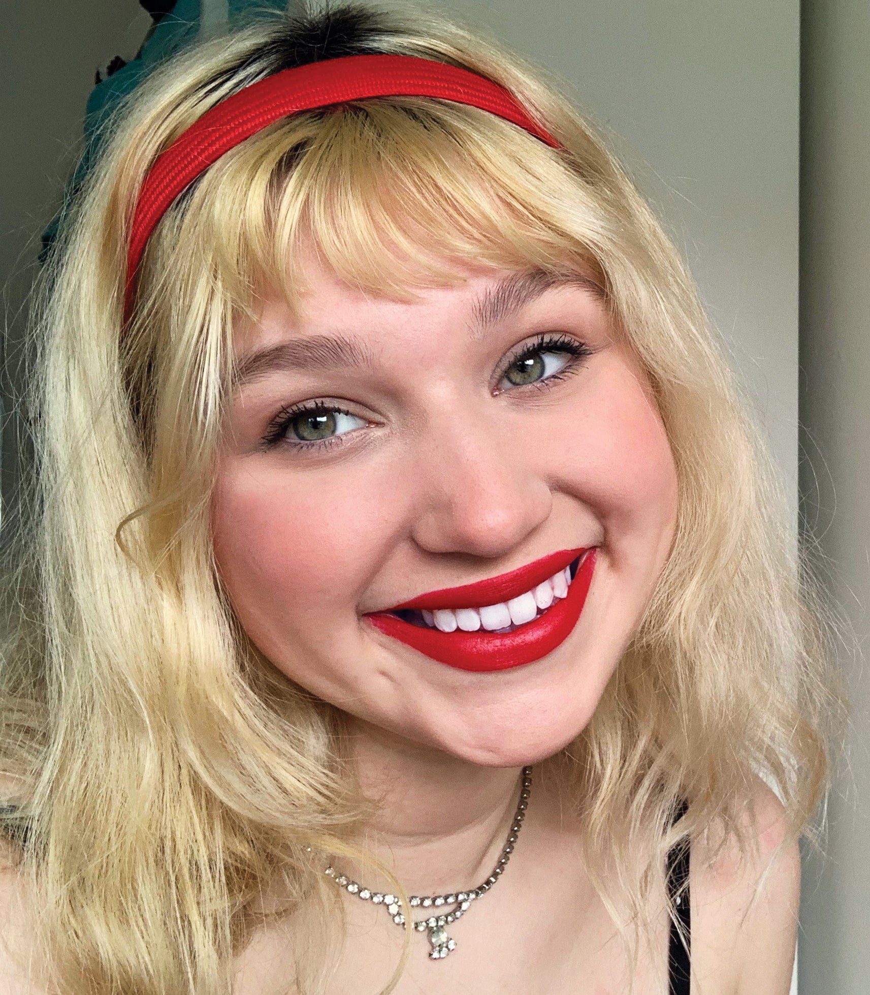A woman smiling.
