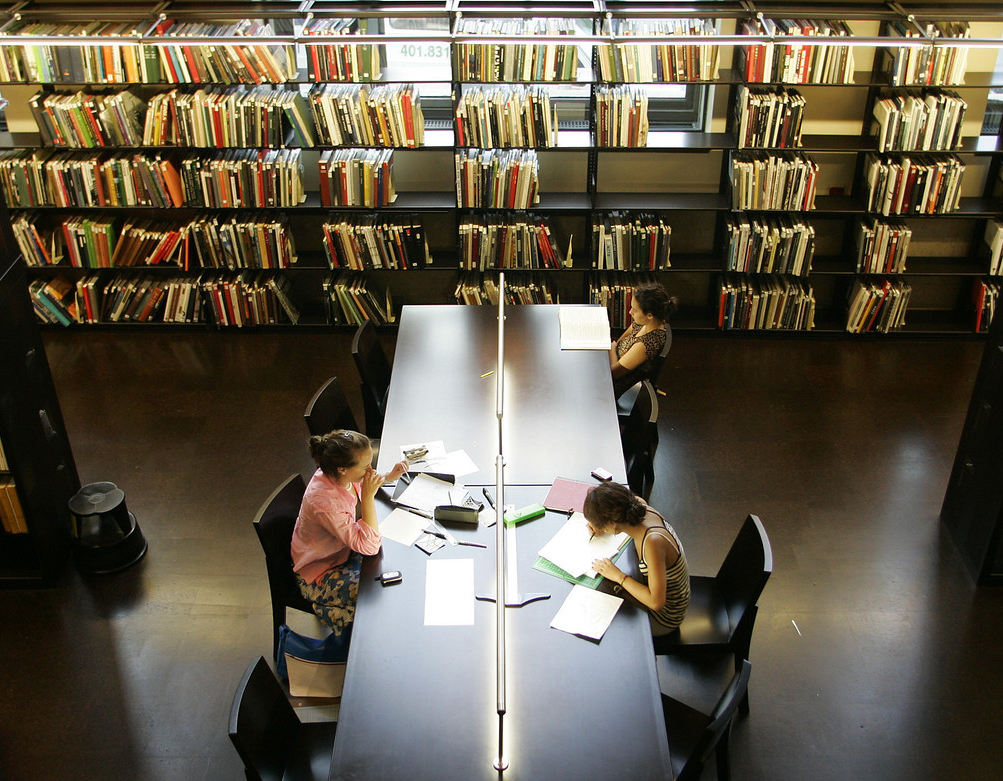 Image of students sitting at a table in the Fleet Library