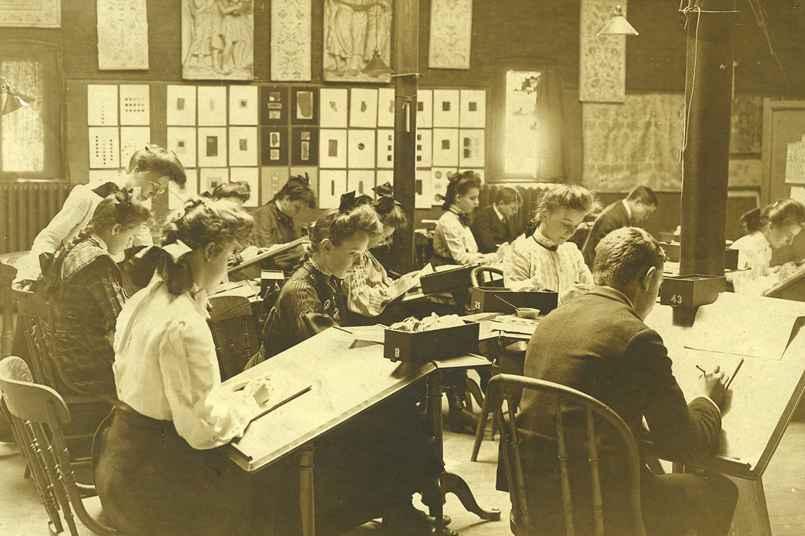 Historic photo of students in class.
