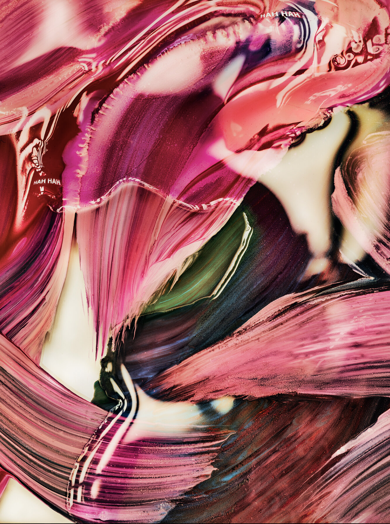 Abstract work with swirling colors in shades of pink, purple, red and green