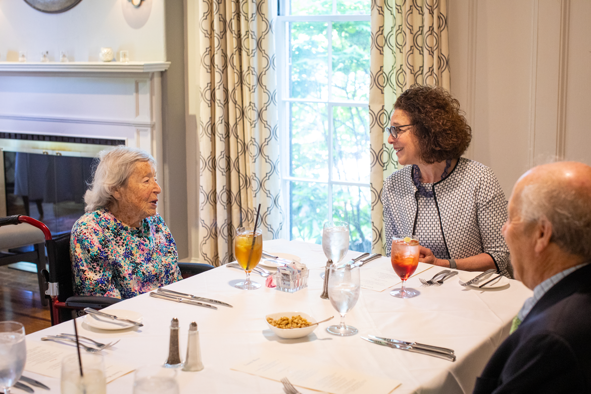 President Rosanne Somerson speaking with Vera and Stephen Metcalf