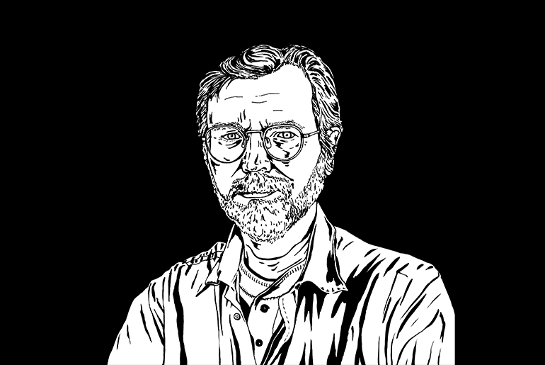 Black and white portrait of an older man with a Beard and glasses in a button down shit