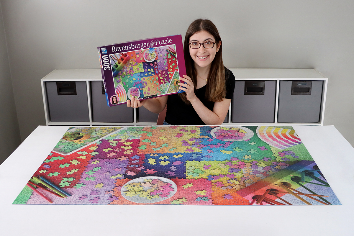 Alum makes puzzle with Ravensburger