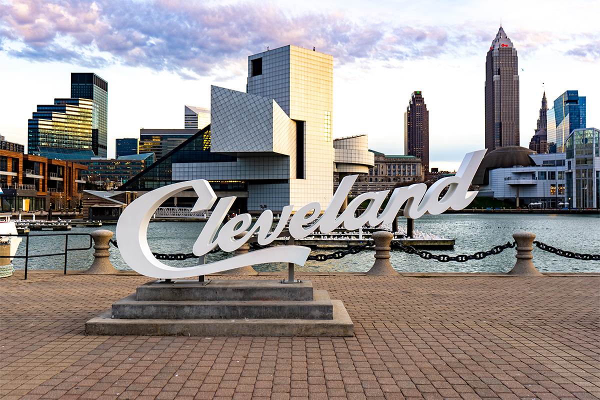 Cleveland sign in front of the Cleveland skyline