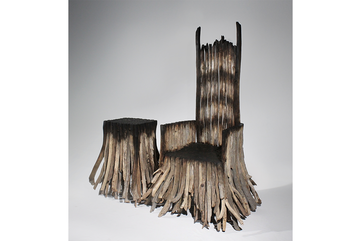 A chair and table made of driftwood