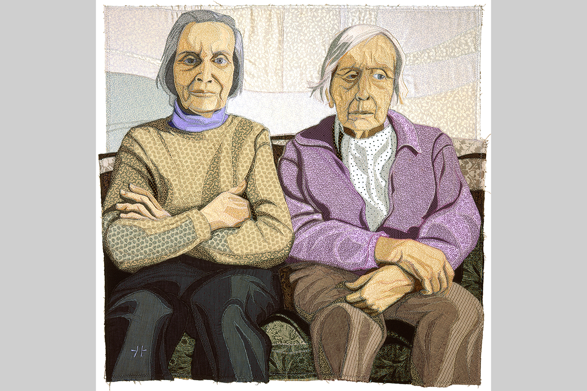 A thread-on-fabric portrait of two older women sitting next to each other