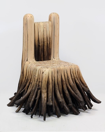 A chair made with walnut-stained driftwood