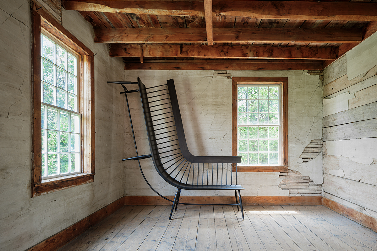 An L-shaped bench extending towards the ceiling