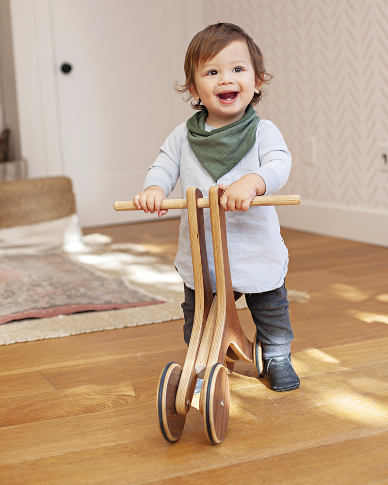 The Boomerang grows with each child, transforming from a walker to a bike to a scooter. Photo by Rachel Barret