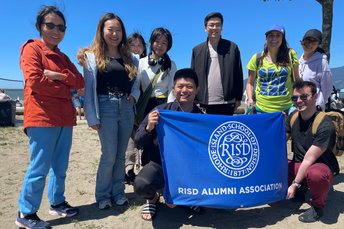 Group of alumni with RISD Flag