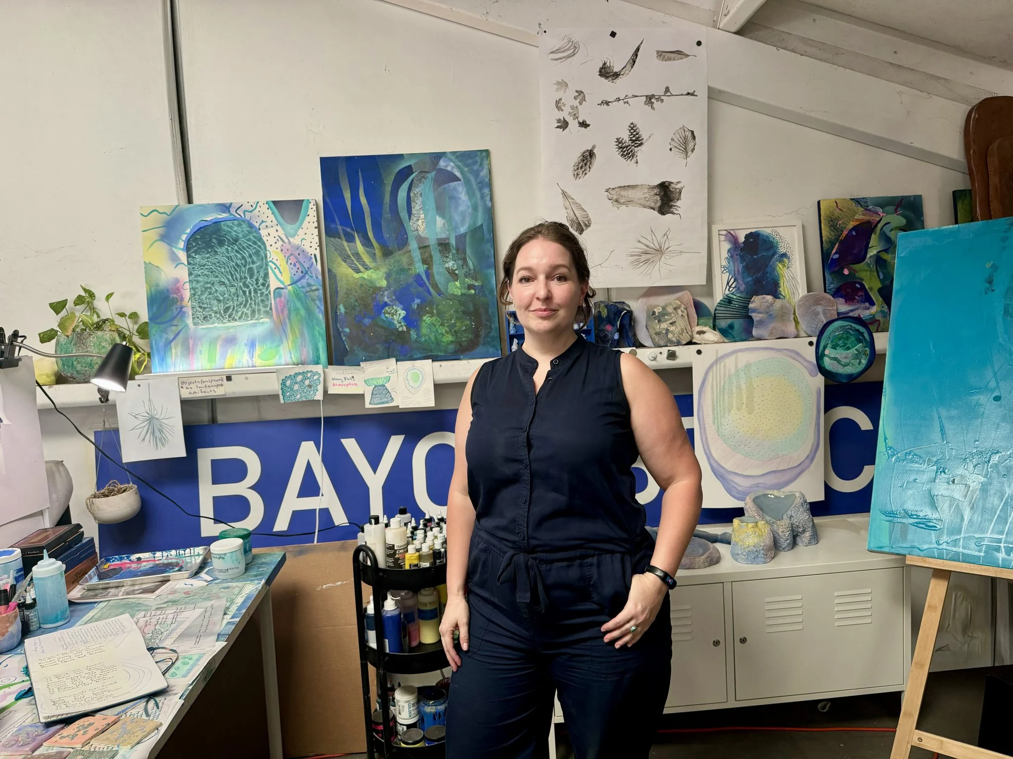 Falon Mihalic, a Houston artist who created an installation titled Abandoned Garden for Meow Wolf Radio Tave in her studio space. Photo by Sarah Cascone.
