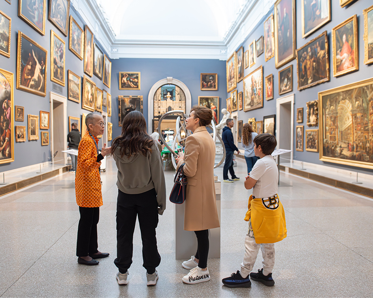 Visitors standing in the grand gallery at the Wadsworth Atheneum
