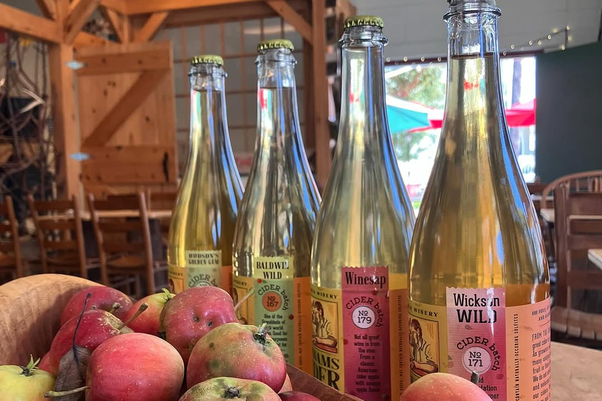 Cider bottles and apples