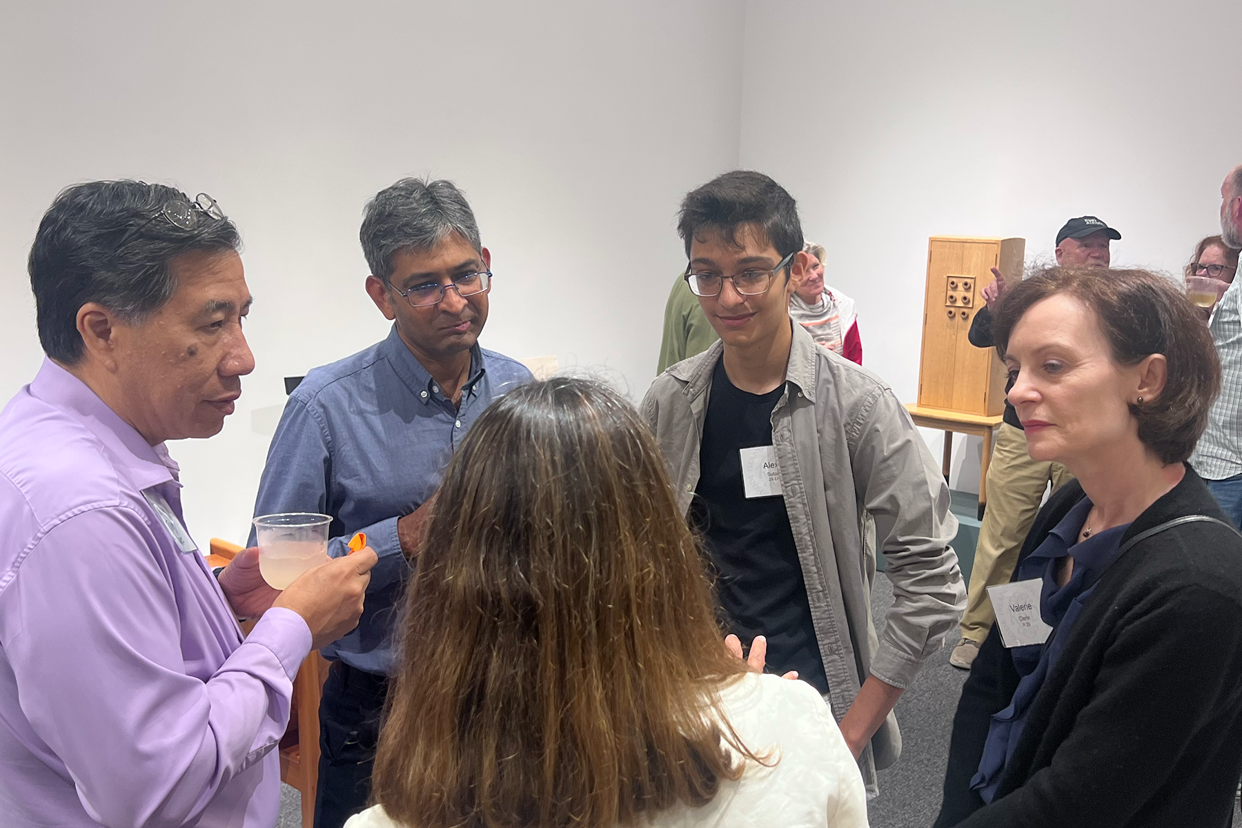 RISD Community Members speaking in a gallery