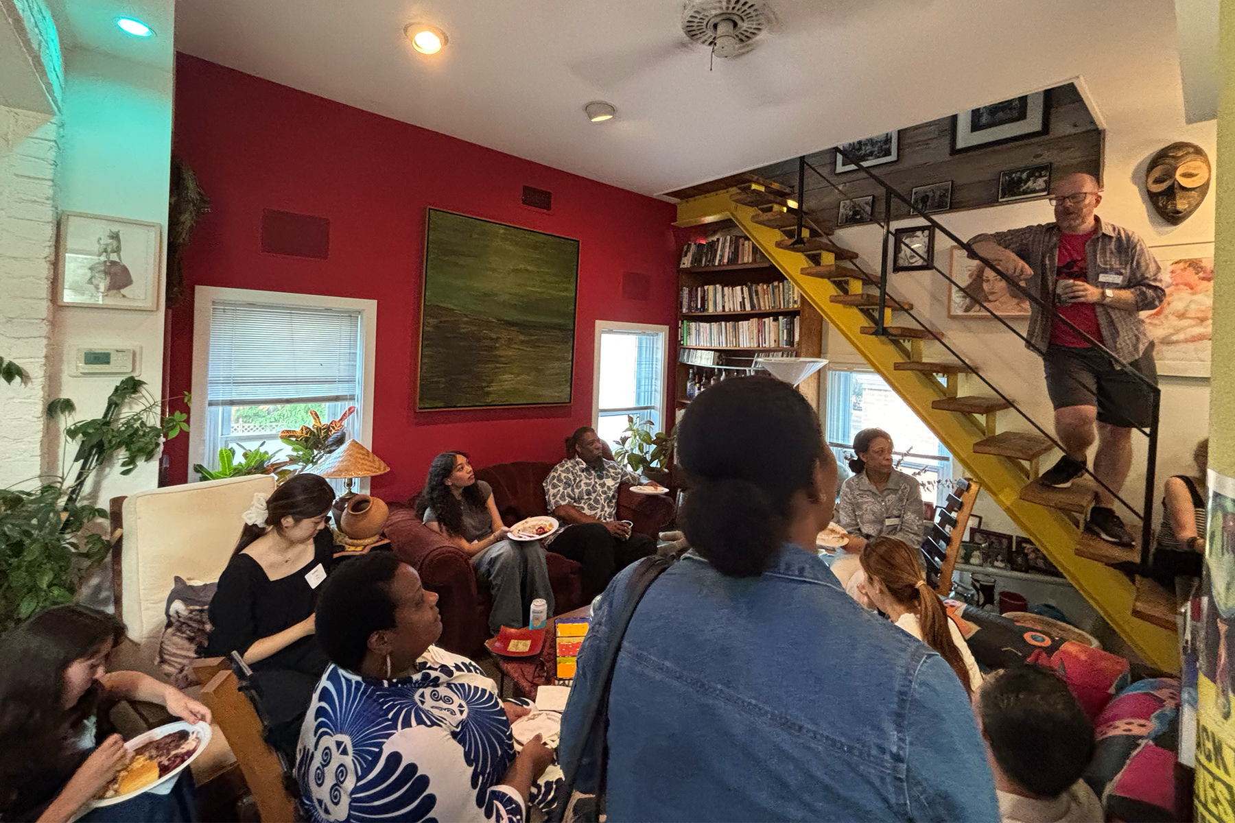 Community members gathered in a living room space