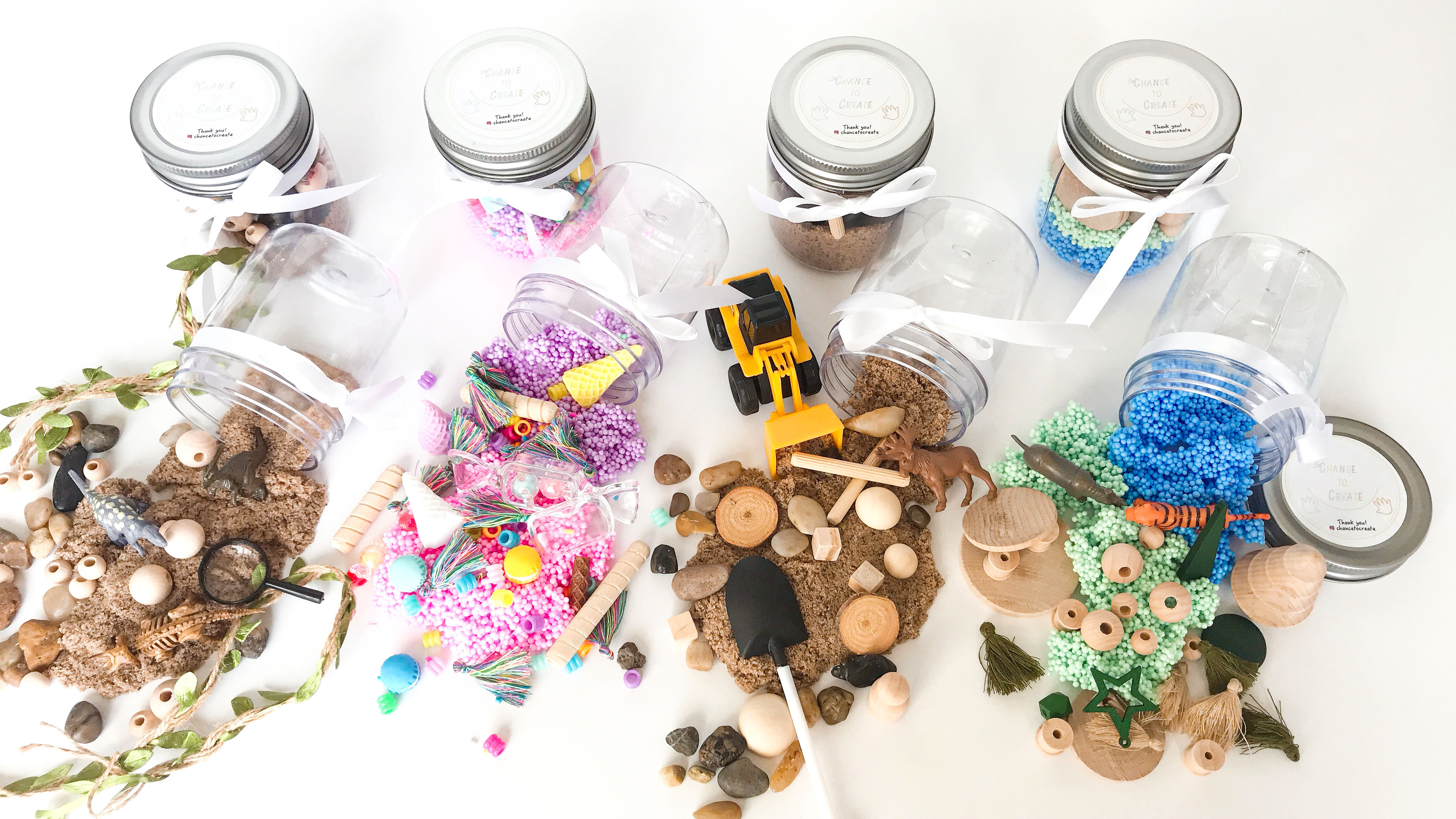 An image of four mini sensory toy kits
